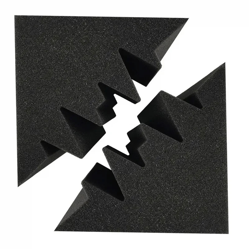 Two black foam corner panels seen from above, with the stepped profiles facing each other