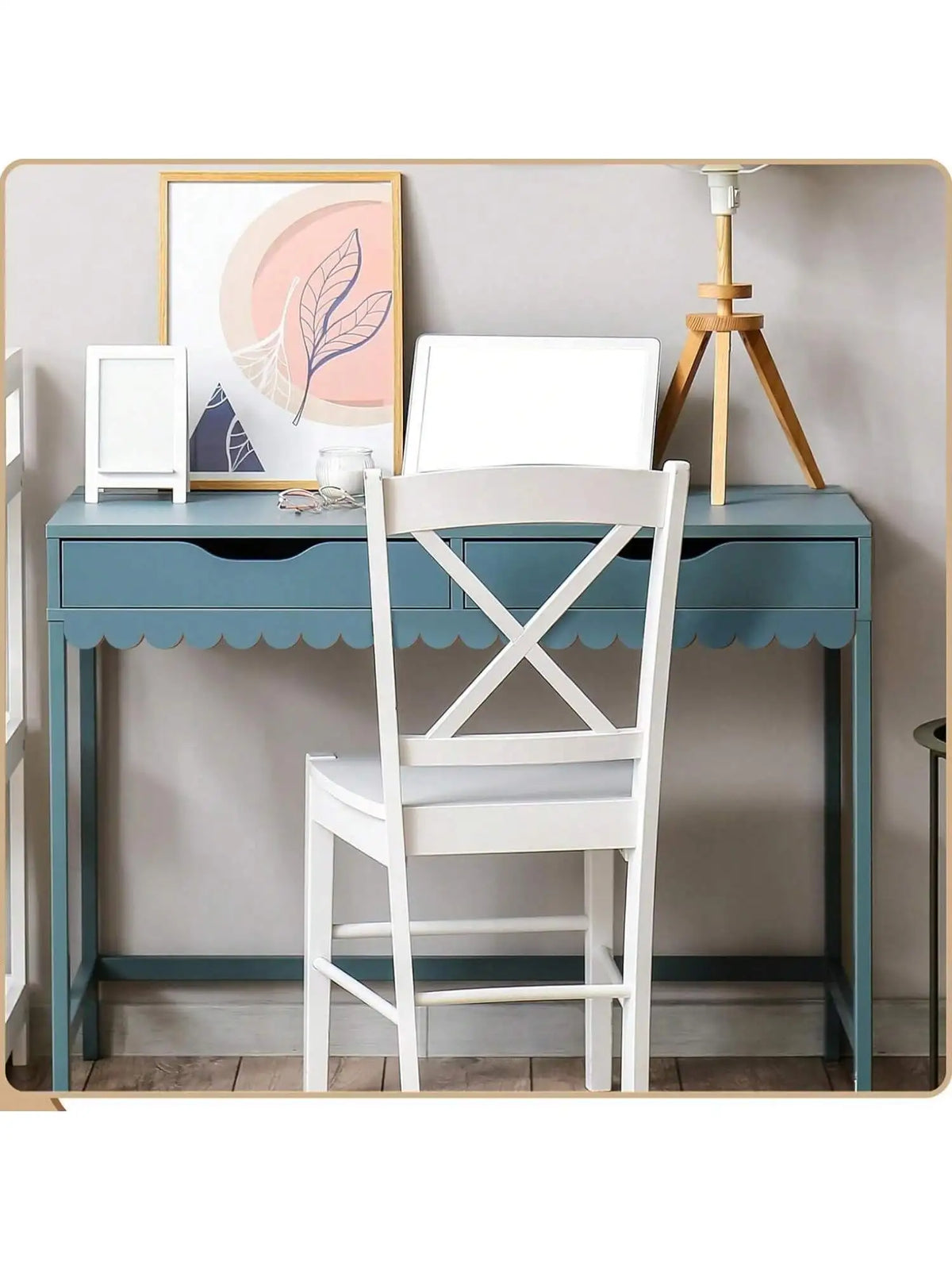 Light blue desk with a scalloped wooden moulding under the drawers