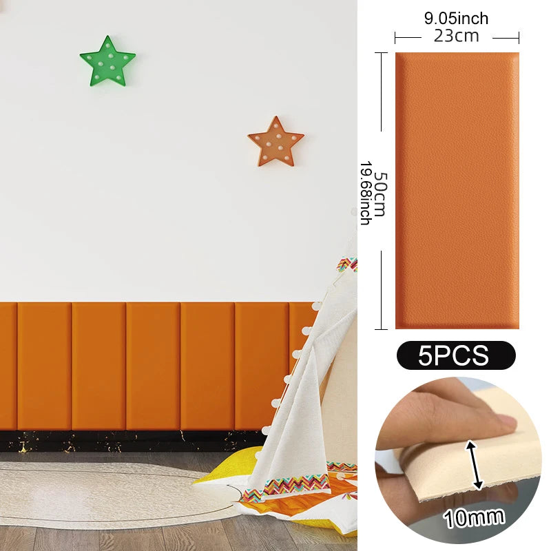 Orange gepolsterte Paneele in einem Kinderzimmer und ein Paneel mit 23 × 50 cm