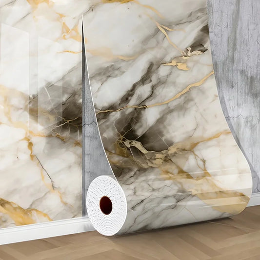 Marble effect roll with smoky grey and golden veins unrolling next to a covered wall