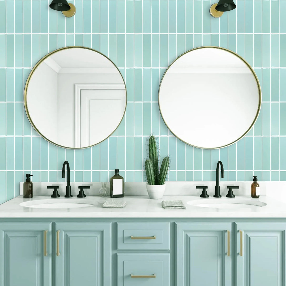 Bathroom with two round mirrors and a light blue wall of rectangular tiles above the washbasin