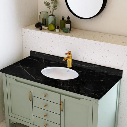 Grüner Badschrank mit Arbeitsplatte, beklebt mit schwarzer Folie in Marmoroptik