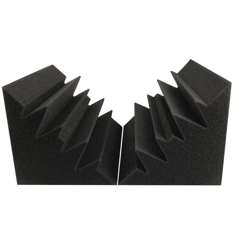 Two black acoustic foam corner panels with a stepped face on a white background