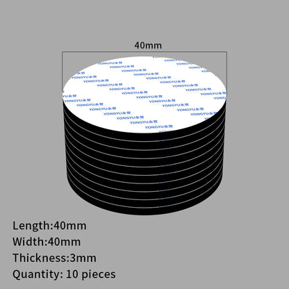 Kymmenen mustaa pyöreää kaksipuolista palaa, halkaisija 40 mm, paksuus 3 mm