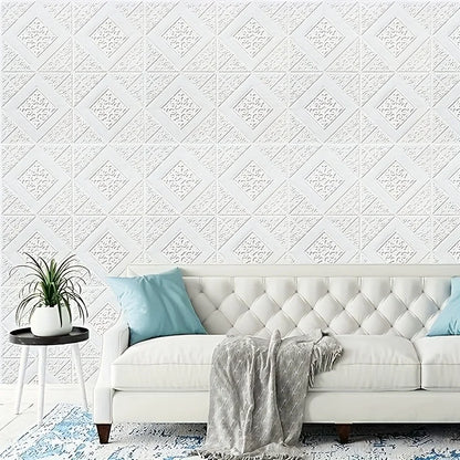 Muur achter de bank bekleed met witte 3D panelen met een ruitmotief