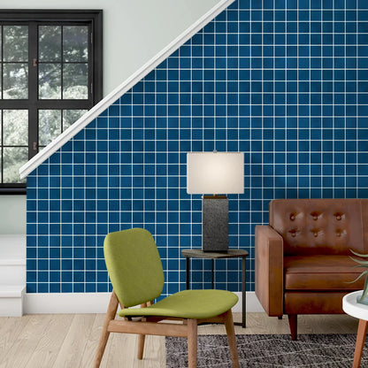 Living room with the space under the stairs covered in dark blue square panels