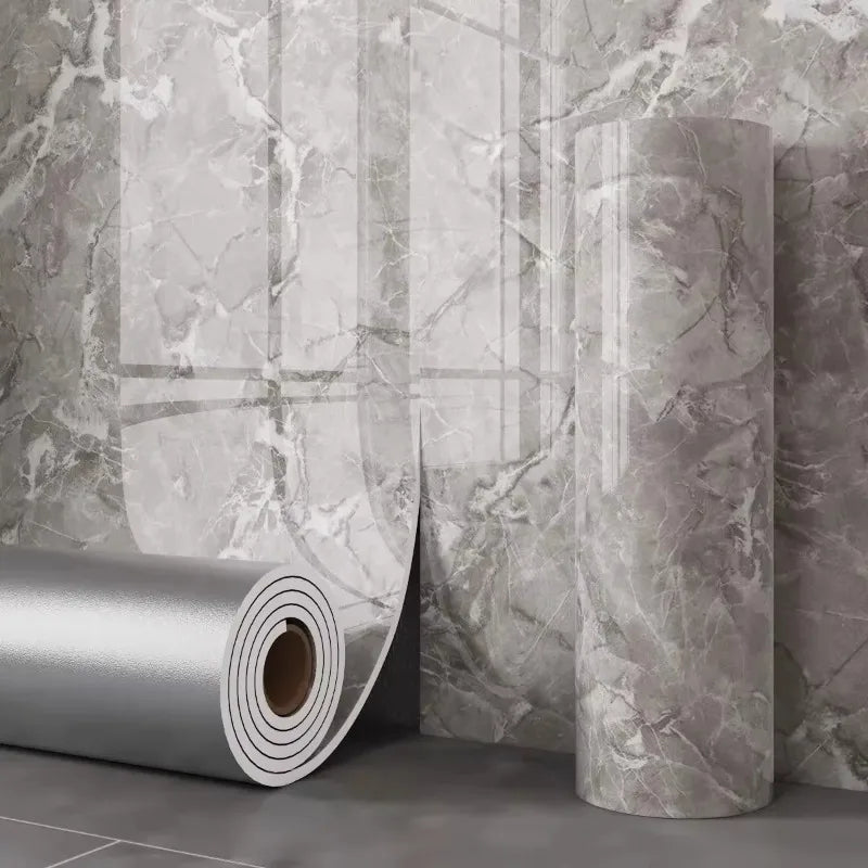 Grey marble effect panel with a grey background and light veins, unrolled roll and roll standing upright