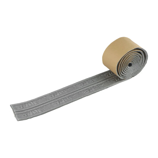 Grey foam self-adhesive moulding, rolled up, with a beige back, on a white background