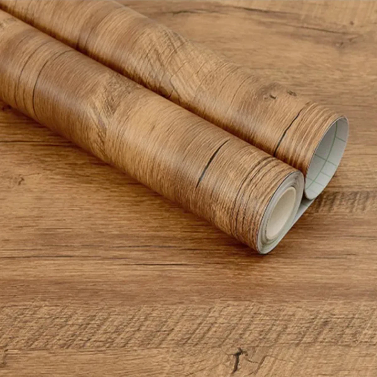 Two rolls of medium rustic wood effect vinyl with knots