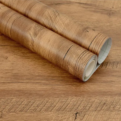 Two rolls of medium rustic wood effect vinyl with knots