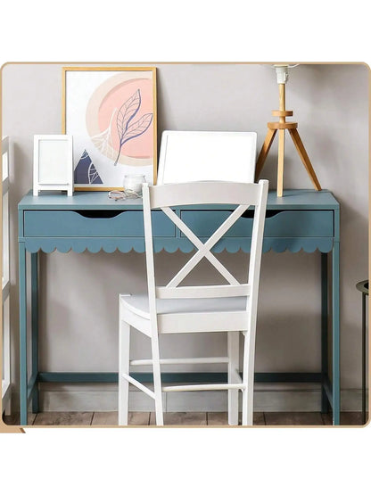 Light blue desk with a scalloped wooden moulding under the drawers