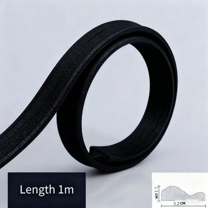 Rol zwarte sierlijst van 32 mm, op zichzelf opgerold, 1 m lang