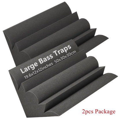 Two black foam acoustic corner panels on a white background