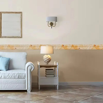 Living room with a yellow and white decorative band halfway up the wall