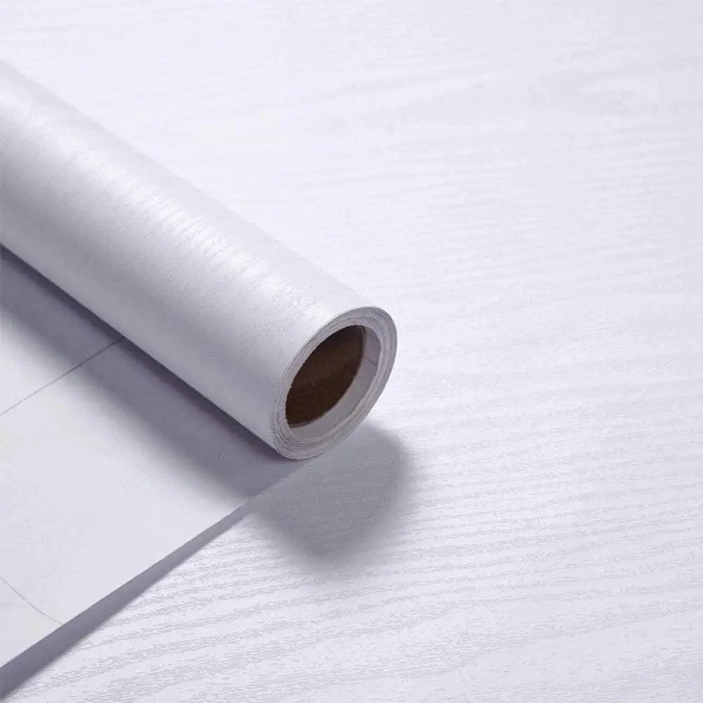 Roll of white wood effect vinyl wrap, Model 1, on a light background