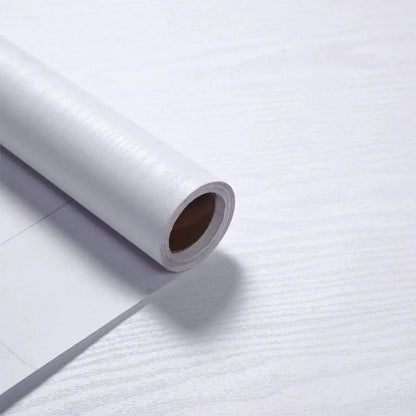Roll of white wood effect vinyl wrap, Model 1, on a light background