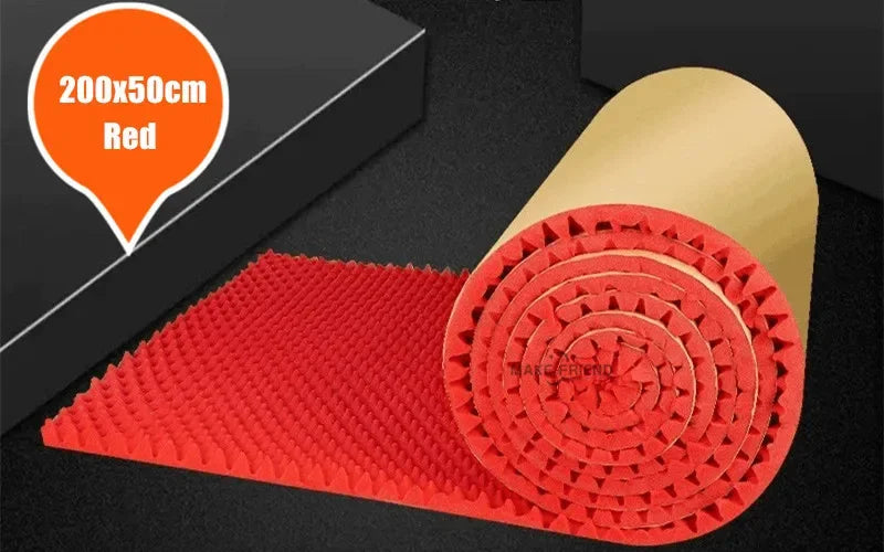 Roll of red acoustic foam with round bumps and a kraft paper back