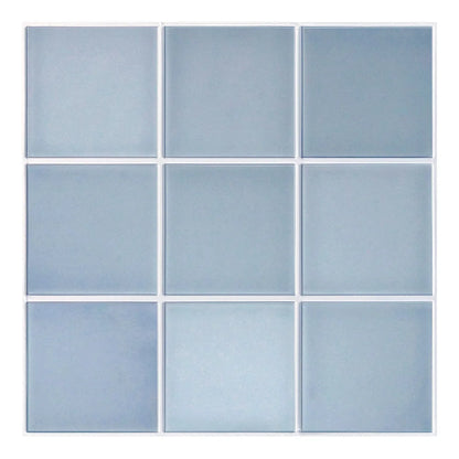 Hemelsblauwe plaat van 30 × 30 cm met negen vierkanten op een witte achtergrond