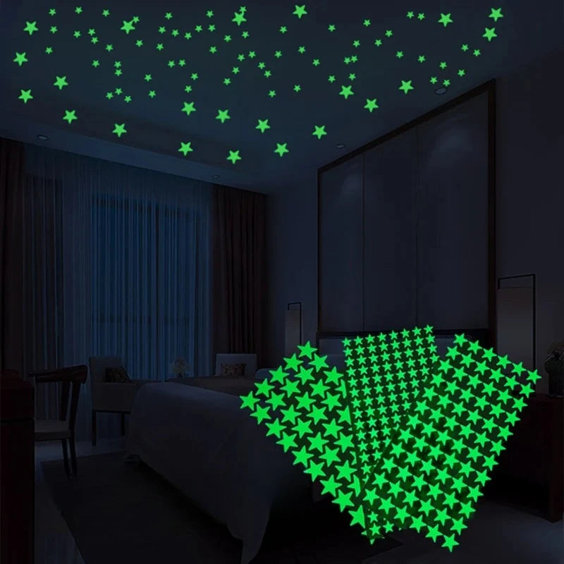 Glow in the dark stars on a room ceiling and three sheets of stars in the foreground