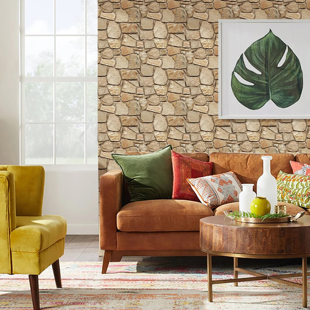 Living room wall covered with brown stone effect panels behind the sofa
