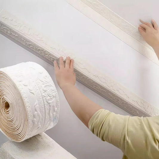 Roll of ivory white decorative self-adhesive strip along the edge of a ceiling