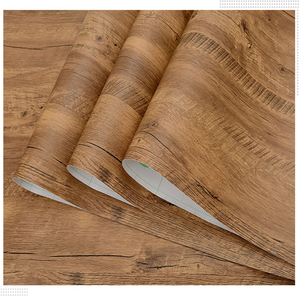 Three rolls of rustic brown wood effect vinyl wrap with dark grain, Model 4