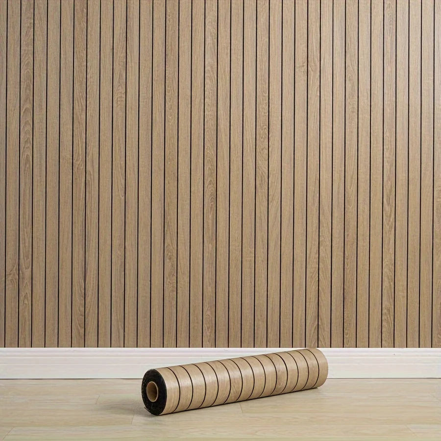 Wall covered with a panel with vertical black stripes and a roll resting on the floor
