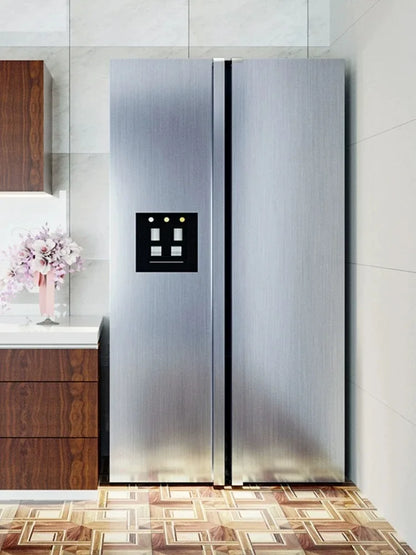Two-door fridge covered in stainless steel effect vinyl in a kitchen