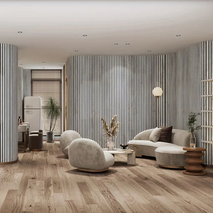 Living room with a curved wall covered with grey slat panels