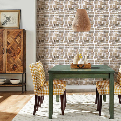 Dining room with a wall of brown-grey stone effect adhesive panels