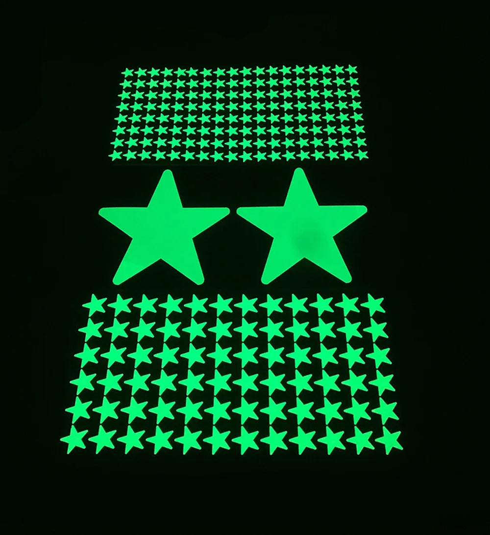 Sheet of small stars, two large stars and a sheet of medium stars that glow in the dark