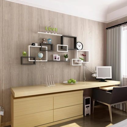 Office wall covered in wood effect adhesive vinyl, with desk and shelves