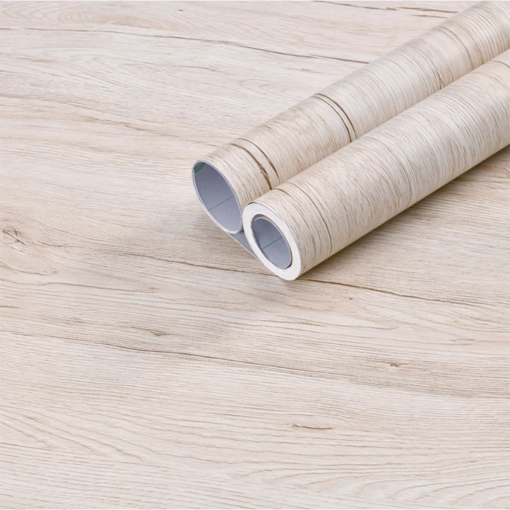Two rolls of very pale wood effect vinyl wrap, almost cream, Model 7