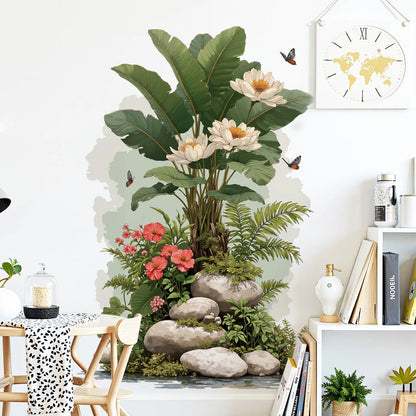 Muursticker met een tropische plant bij een eettafel en een plank