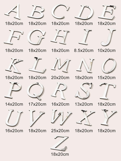 Alphabet of silver mirror letters showing the width of each letter, height 20 cm