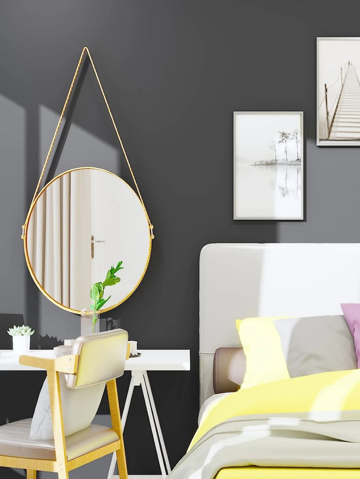 Schlafzimmer mit einer Wand, die mit dunkelgrauer Möbelfolie beklebt ist, und einem runden Spiegel