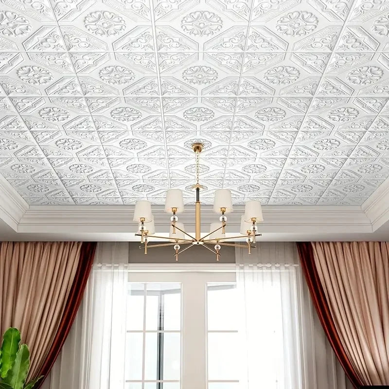Ceiling with a lamp covered with white adhesive ceiling rose panels