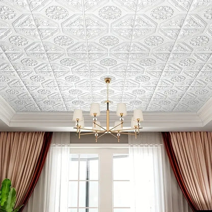 Ceiling with a lamp covered with white adhesive ceiling rose panels