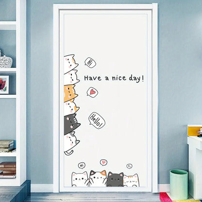 Cartoon cat stickers on a white door in a nursery
