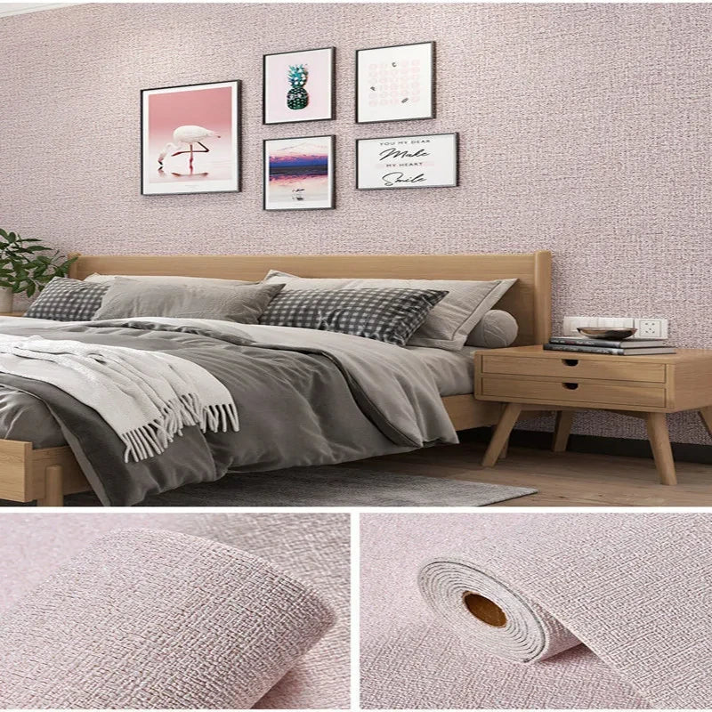 Muur bekleed met roze linnenlook, met de rol en een close-up van de weving