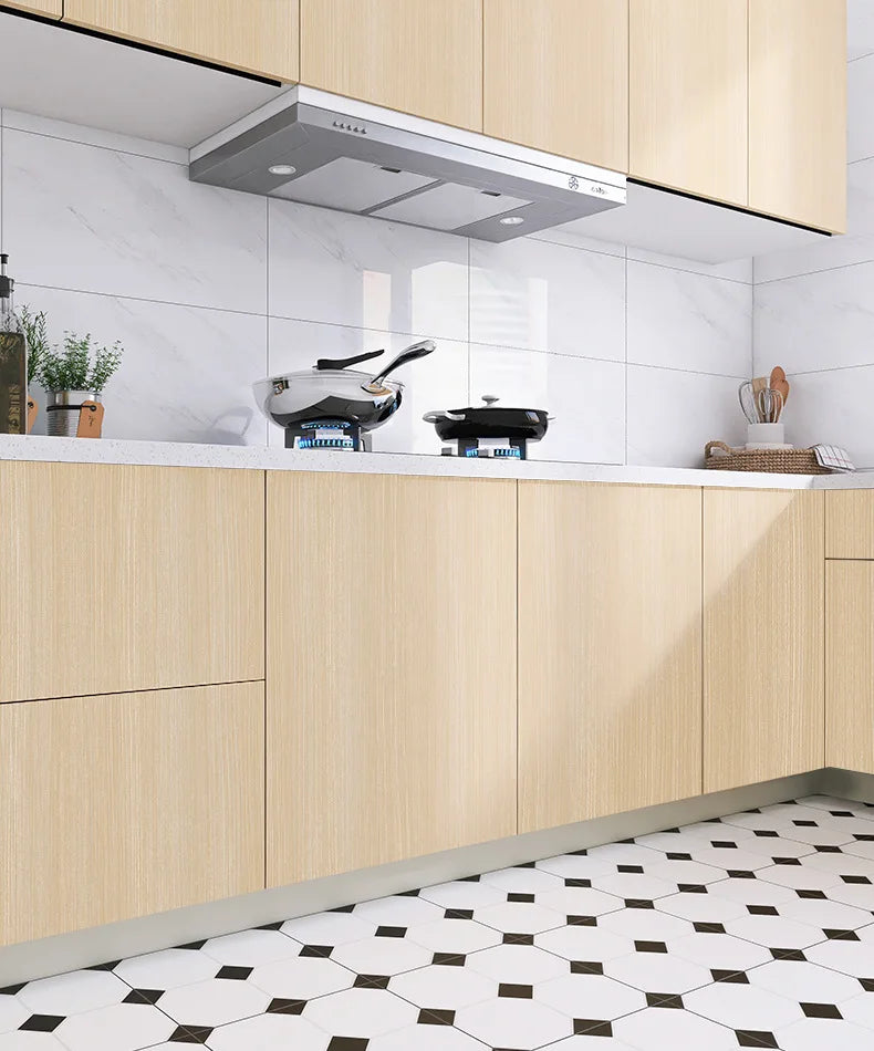 Kitchen with light wood effect doors and white splashback