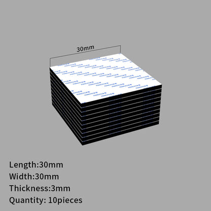 Kymmenen mustaa neliönmuotoista kaksipuolista palaa, 30 × 30 mm, paksuus 3 mm