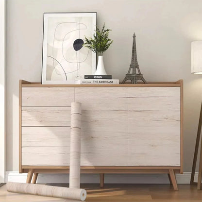 Sideboard, mit Folie in gebleichter Holzoptik beklebt, mit Rollen am Fuß des Möbels
