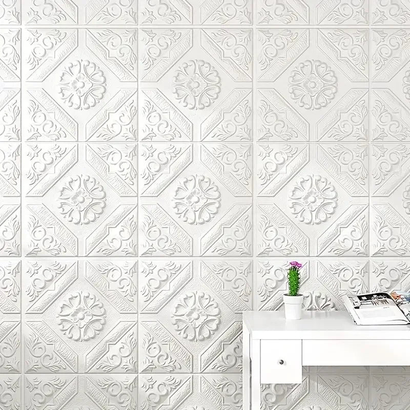 Wall covered with white adhesive ceiling rose panels behind a desk