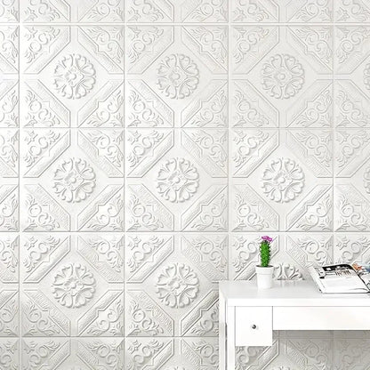 Wall covered with white adhesive ceiling rose panels behind a desk