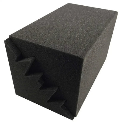 Black foam corner panel seen three-quarter view, with the stepped profile on one side