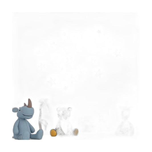 Zwarte muurstickers met sterren op een witte muur naast knuffels
