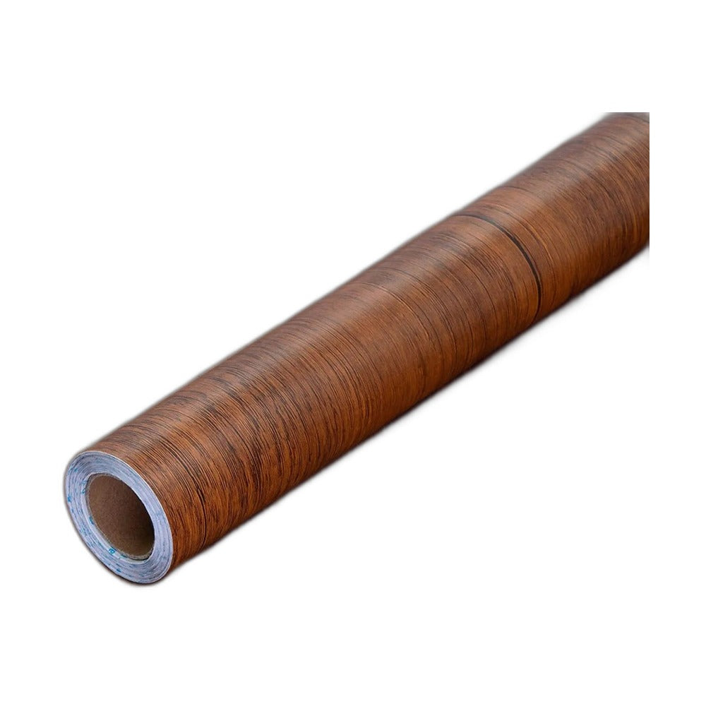 Roll of brown wood effect vinyl wrap with dark grain, resting on a wooden surface